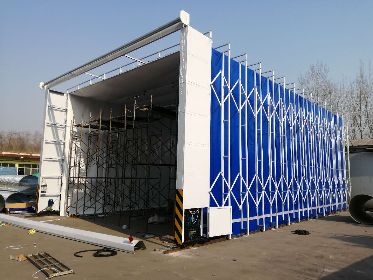 The technical characteristics and working principle of retractable integral mobile spray painting room